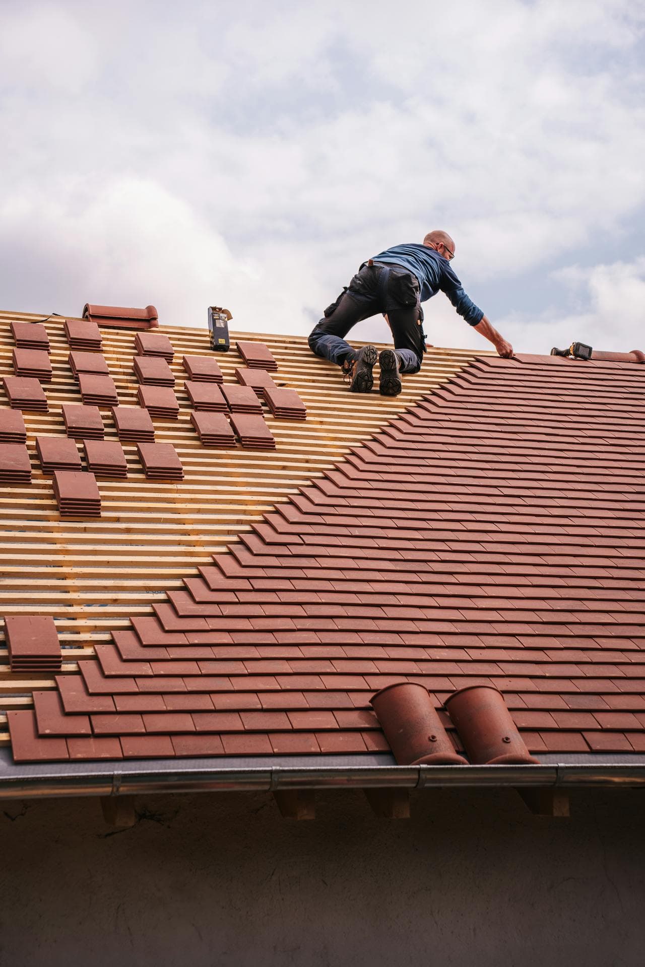 An EZ Roof professional installing a new roof
