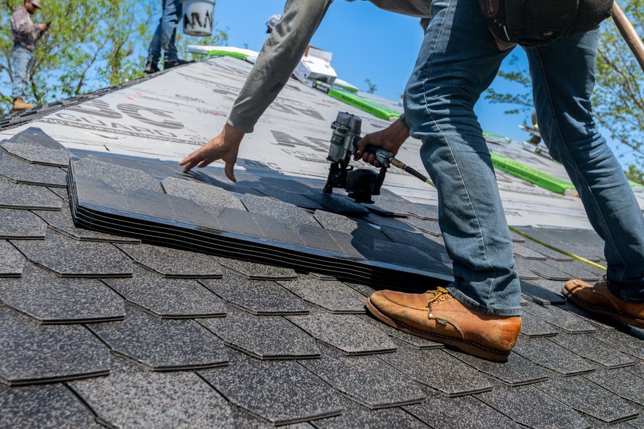 EZ Roof crew installing architectural shingles